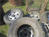 620) 4 buckshot tires w/4 15" Ford wheels