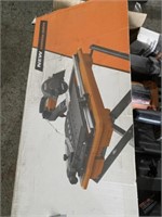 1468) Ridgid 7" wet tile saw w/stand  AS IS