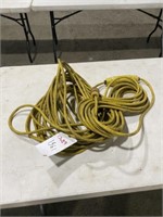 1561) 2 extension cords- 50' & 25'