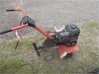 1350) Yard Machine front tine tiller - new carb. -