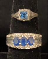 2 STERLING RINGS W/ BLUE STONES