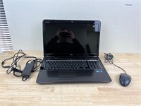 Dell laptop with charger and mouse