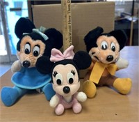 2 Minnie Mouse and 1 Mickey stuffed dolls