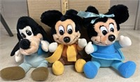 Goofy, Mickey Mouse and Minnie Mouse stuffed dolls