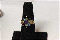 A 10 Kt Yellow Gold and Gemstone Ring