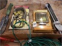 misc. gardening items; caulking gun; solar panel