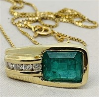 14KT YELLOW GOLD 6.00CT EMERALD & .25CT DIA.