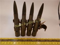 4-50 caliber shells & 2 decorative brass pcs