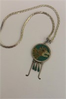 A Sterling Inlaid Doublesided Pendant and Necklace