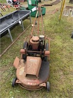 667) Push mower- needs carb. work