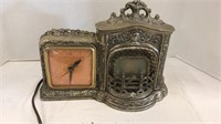 Antique novelty fireplace clock