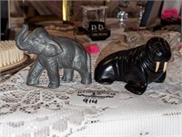 Walrus carving & Elephant statue