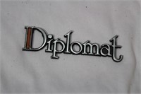A Vintage Metal Diplomat Sign