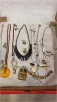 BOX OF DECORATIVE JEWELRY