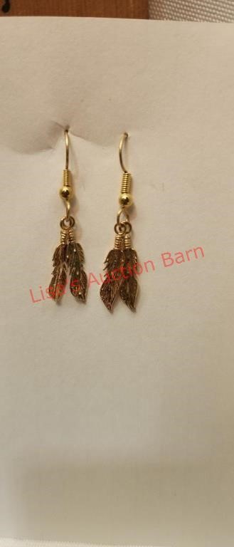 10 k gold earrings  dangling  feathers