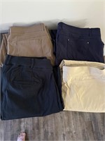 Four pairs of women’s dress pants, size 22