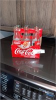 Six original tastes glass Coca-Cola bottles