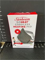 Brand new heating pad, open box
