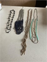 Lot of 4 long layered necklaces
