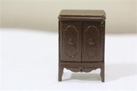 A Miniature Metal Armoire