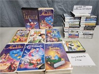 8 Walt Disney  VHS Tapes, 25 EMPTY Nintendo cases