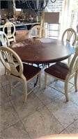 Iron base oak table with 6 chairs
54 inch oak