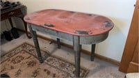 Distressed wood, oval table 
48 inches long 24