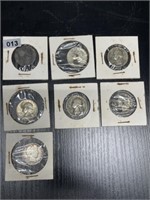 Seven silver quarters