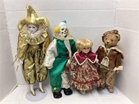 Four Porcelain Dolls with Stands