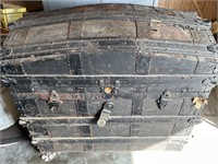 Antique Aaron L Weil Black Camelback trunk