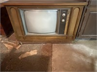 Vintage floor model Zenith tv & bottom content