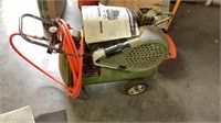 Montgomery Ward air compressor with manual.