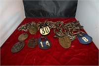 4) COW TAGS WITH CHAINS AND 4 EXTRA TAGS,