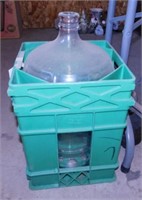 Crisa glass carboy bottle in plastic crate, made