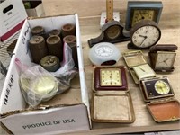 Lot of alarm clocks and clock weights