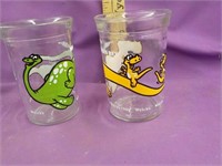 2 Welch's dino glasses