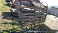ANTIQUE LOADING CHUTE FRAME WITH STEEL WHEELS