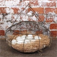 A Fine 19th C. Woven Wire Egg Basket containing