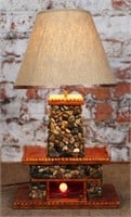 A Folk Art Fireplace Form Table Lamp, carved wood