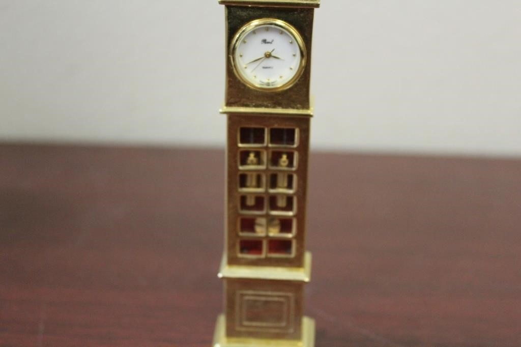 A Metal Grandfather Style Quartz Clock