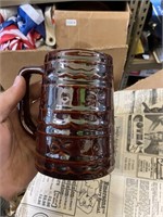 7 brown pottery mugs USA on bottom