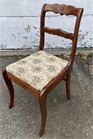 Upholstered Chair with Carved Back