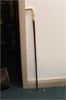 A Carved Handle Cane