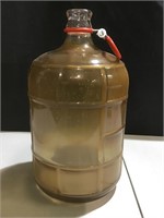 Approx 3 gallon jug, brown residue inside