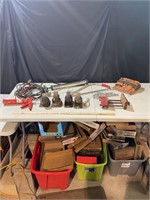 Assorted casters, cables, vise, air pump, more