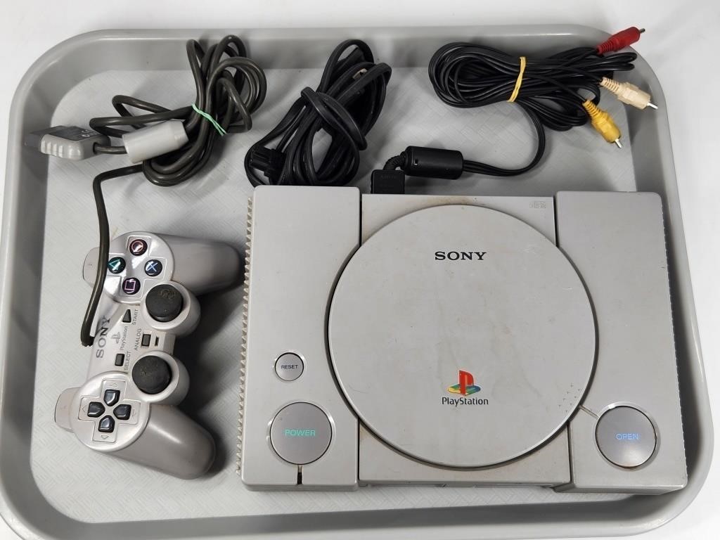 PLAYSTATION VIDEO GAME CONSOLE W/ CORDS