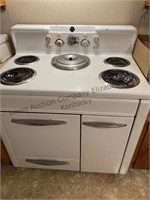 Vintage Home Comfort Range with 4 burners and a