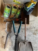 Landscape stakes, small shovel, garden tools and