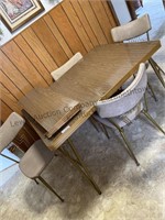 Vintage table with two leafs and 4 chairs