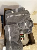 3 boxes of towels, hand towels and washcloths